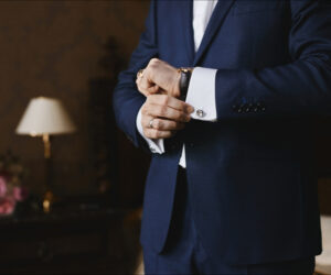 close-view-of-the-luxury-watches-on-the-hand-of-businessman-in-suit-and-in-shirt-with-cufflinks
